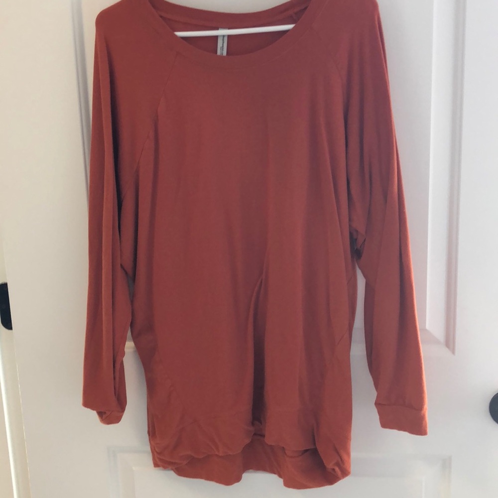 Burnt orange tunic.
